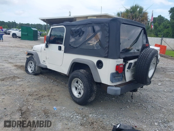 2005 Jeep Wrangler Unlimited with VIN 1J4FA44S65P368475, listed as a IAAI auction lot 42484636 with Not provided miles and . Bid and sale history available at DreamBid. Image 3.