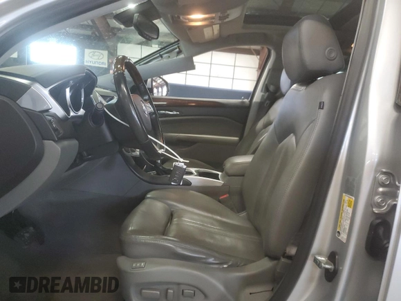 2011 Cadillac SRX Turbo Premium Collection with VIN 3GYFNKE65BS530734, listed as a Copart auction lot 51289145 with 121,879 mi miles and Salvage title. Bid and sale history available at DreamBid. Image 7.