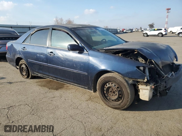 2004 Toyota Camry LE z VIN 4T1BE32K64U329578, wystawiony jako Copart lot #85528744 z przebiegiem Nie podano mil oraz Czysty tytuł • Clean title. Historia ofert i sprzedaży dostępna na DreamBid. Obrazek 4.