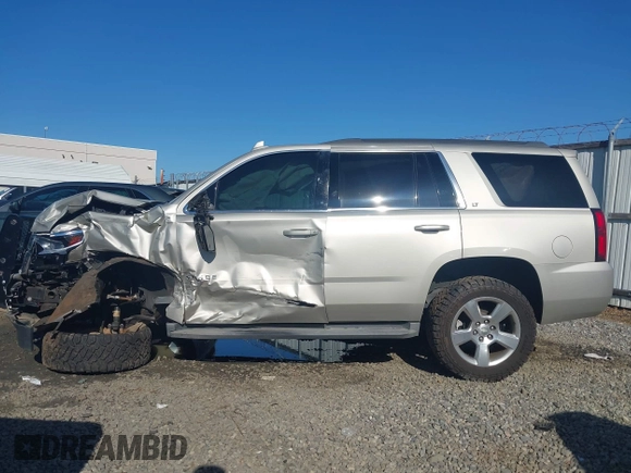 2015 Chevrolet Tahoe LT with VIN 1GNSCBKC8FR646756, listed as a IAAI auction lot 41856070 with 138,495 mi miles and . Bid and sale history available at DreamBid. Image 14.