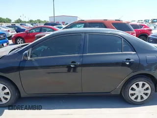 2011 Toyota Corolla L with VIN JTDBU4EE9BJ096586, listed as a IAAI auction lot 41992120 with 201,297 mi miles. Bid and sale history available at carsss.com. Image 15.