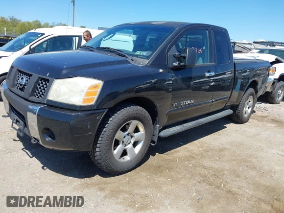 2006 Nissan Titan SE with VIN 1N6BA06B76N534667, listed as a IAAI auction lot 42143765 with 165,208 mi miles and . Bid and sale history available at DreamBid. Image 2.