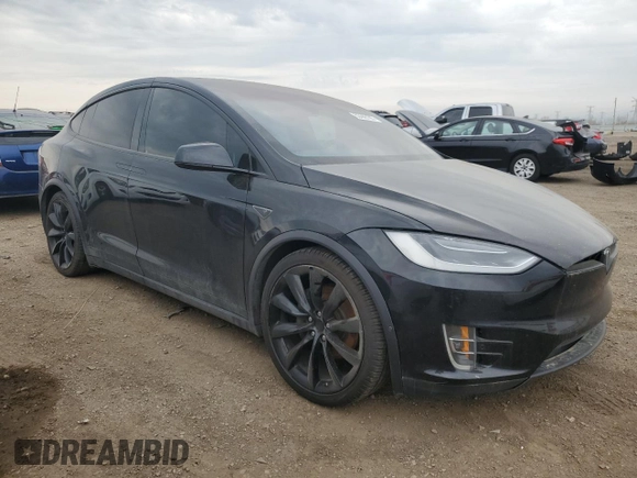 2016 Tesla Model X 70D z VIN 5YJXCAE28GF008476, wystawiony jako Copart lot #53448105 z przebiegiem Nie podano mil oraz Szkody całkowita. Historia ofert i sprzedaży dostępna na DreamBid. Obrazek 4.