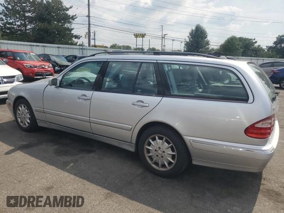 2001 Mercedes-Benz E-Class with VIN WDBJH65J41B201471, listed as a Copart auction lot 68863194 with 106,893 mi miles and Salvage Title. Bid and sale history available at carsss.com. Image 2.