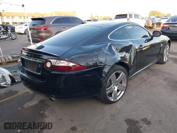 2008 Jaguar XK with VIN SAJWA43B985B23987, listed as a IAAI auction lot 41197091 with 54,803 mi miles. Bid and sale history available at carsss.com. Image 4.