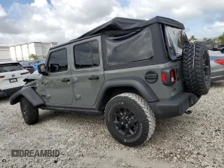 2021 Jeep Wrangler Unlimited Willys with VIN 1C4HJXDM6MW628041, listed as a Copart auction lot 51366415 with 22,697 mi miles and Salvage title. Bid and sale history available at DreamBid. Image 2.