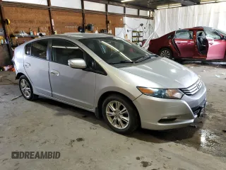 2010 Honda Insight EX with VIN JHMZE2H76AS021610, listed as a Copart auction lot 62992225 with 162,974 mi miles and Salvage title. Bid and sale history available at DreamBid. Image 4.