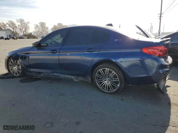 2019 BMW 5 Series 530e iPerformance with VIN WBAJA9C51KB389944, listed as a Copart auction lot 87080924 with 83,935 mi miles and Salvage Title. Bid and sale history available at carsss.com. Image 2.
