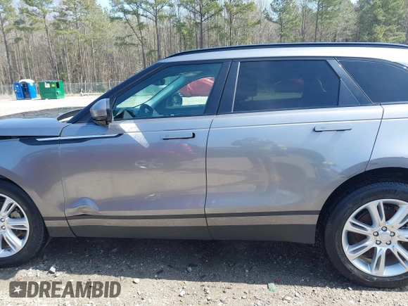 2020 Land Rover Range Rover Velar S z VIN SALYB2EX7LA259607, wystawiony jako IAAI lot #40980294 z przebiegiem 95 967 mil mil oraz . Historia ofert i sprzedaży dostępna na DreamBid. Obrazek 14.