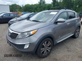 2013 Kia Sportage EX with VIN KNDPCCA26D7428000, listed as a IAAI auction lot 42684573 with 155,722 mi miles and . Bid and sale history available at DreamBid. Image 2.