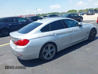 2016 BMW 4 Series 428i with VIN WBA4A9C54GG506519, listed as a IAAI auction lot 42288722 with 116,863 mi miles and . Bid and sale history available at DreamBid. Image 4.