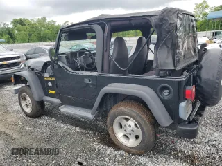 2002 Jeep Wrangler Sport with VIN 1J4FA49S12P730135, listed as a Copart auction lot 54477835 with 148,153 mi miles and Salvage title. Bid and sale history available at DreamBid. Image 2.