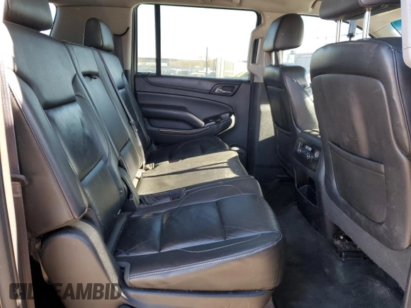 2015 Chevrolet Suburban LT with VIN 1GNSKJKC2FR274506, listed as a Copart auction lot 87881695 with 196,506 mi miles and Salvage Title. Bid and sale history available at DreamBid. Image 11.