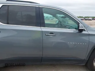 2018 Chevrolet Traverse LT z VIN 1GNERHKW3JJ135861, wystawiony jako IAAI lot #42189570 z przebiegiem 180 113 mil mil oraz . Historia ofert i sprzedaży dostępna na DreamBid. Obrazek 14.