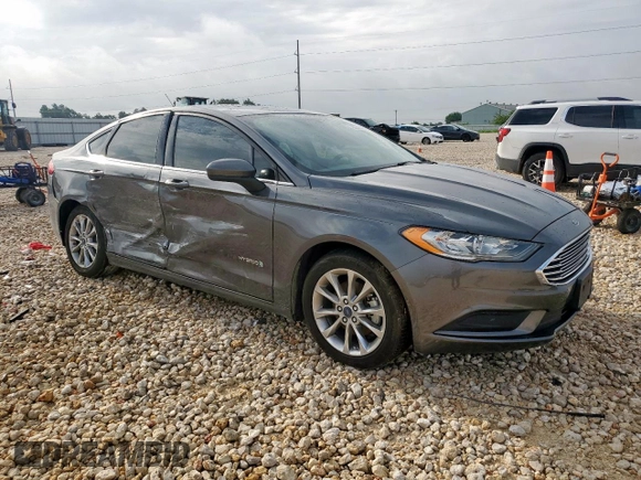 2017 Ford Fusion Hybrid SE with VIN 3FA6P0LU7HR318039, listed as a Copart auction lot 63575325 with 106,355 mi miles and Salvage title. Bid and sale history available at DreamBid. Image 4.