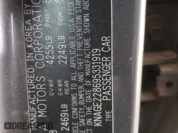 2009 Kia Optima LX z VIN KNAGE228695331919, wystawiony jako Copart lot #57804835 z przebiegiem 199 204 mil mil oraz Szkoda całkowita • Salvage title. Historia ofert i sprzedaży dostępna na DreamBid. Obrazek 12.