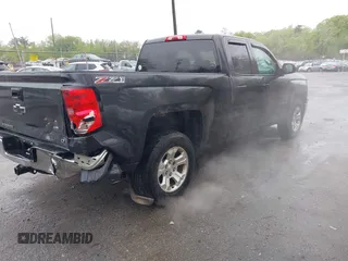 2014 Chevrolet Silverado 1500 LT with VIN 1GCVKREC0EZ181238, listed as a IAAI auction lot 42155213 with 171,893 mi miles and . Bid and sale history available at DreamBid. Image 4.
