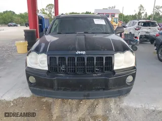 2005 Jeep Grand Cherokee Laredo with VIN 1J4HR48N75C647740, listed as a IAAI auction lot 41803160 with 145,147 mi miles. Bid and sale history available at carsss.com. Image 12.