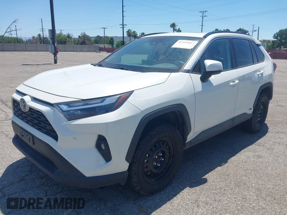 2022 Toyota RAV4 Hybrid XLE Premium z VIN 4T3B6RFVXNU079761, wystawiony jako IAAI lot #42395817 z przebiegiem 73 830 mil mil oraz . Historia ofert i sprzedaży dostępna na DreamBid. Obrazek 2.