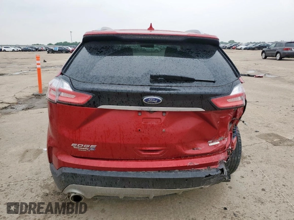 2020 Ford Edge SEL с VIN 2FMPK3J96LBA69376, выставлен на аукционе Copart как лот 57553395 с пробегом 69 468 миль миль и Списание • Salvage title. История ставок и продаж доступна на DreamBid. Изображение 6.