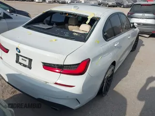 2019 BMW 3 Series 330i with VIN WBA5R1C53KAK08179, listed as a IAAI auction lot 42010397 with 71,975 mi miles and . Bid and sale history available at DreamBid. Image 4.