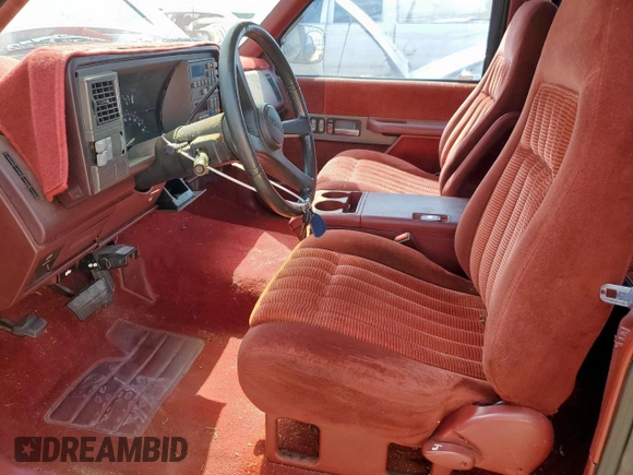 1992 GMC Sierra 1500 with VIN 2GTHC39NXN1556192, listed as a Copart auction lot 55469485 with 128,938 mi miles and Clean Title. Bid and sale history available at DreamBid. Image 7.