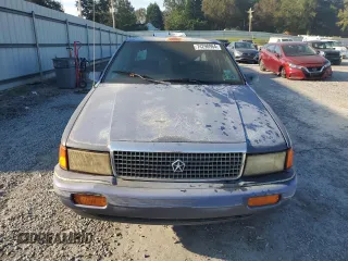 1992 Plymouth Acclaim z VIN 1P3XA46K8NF255561, wystawiony jako Copart lot #74290964 z przebiegiem 126 154 mil mil oraz Szkody całkowita. Historia ofert i sprzedaży dostępna na DreamBid. Obrazek 5.