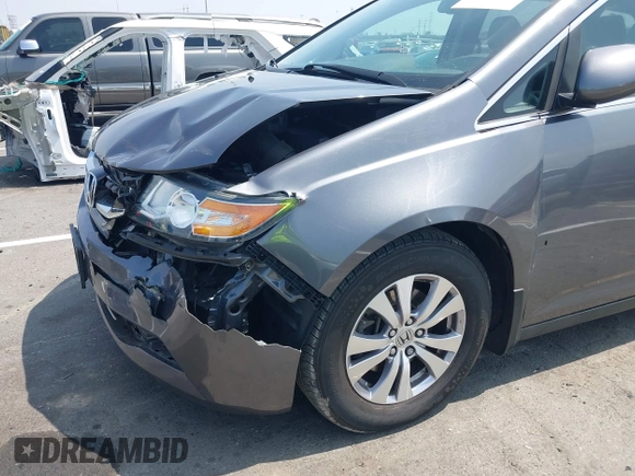 2014 Honda Odyssey EX-L with VIN 5FNRL5H64EB026520, listed as a IAAI auction lot 42562290 with 118,890 mi miles and . Bid and sale history available at DreamBid. Image 6.