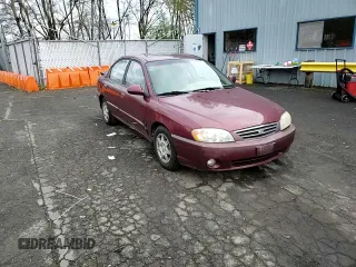2003 Kia Spectra z VIN KNAFB121835211810, wystawiony jako Copart lot #51289625 z przebiegiem 133 868 mil mil oraz Szkoda całkowita • Salvage title. Historia ofert i sprzedaży dostępna na DreamBid. Obrazek 10.