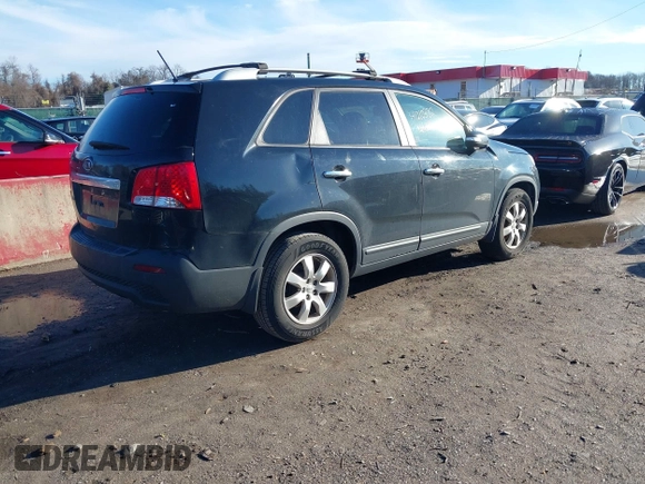 2012 Kia Sorento LX with VIN 5XYKT4A67CG231633, listed as a IAAI auction lot 41210382 with 217,055 mi miles. Bid and sale history available at carsss.com. Image 4.