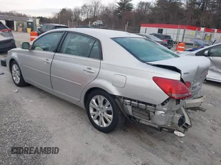 2009 Toyota Avalon XL with VIN 4T1BK36B69U329378, listed as a IAAI auction lot 41387338 with 163,023 mi miles and . Bid and sale history available at carsss.com. Image 3.