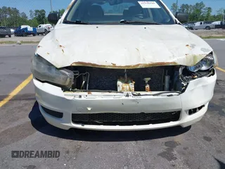2009 Mitsubishi Lancer DE with VIN JA3AU16U29U040688, listed as a IAAI auction lot 42116109 with 202,015 mi miles. Bid and sale history available at carsss.com. Image 6.