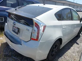 2015 Toyota Prius Four with VIN JTDKN3DU8F1993386, listed as a IAAI auction lot 42333733 with 168,754 mi miles and . Bid and sale history available at DreamBid. Image 4.