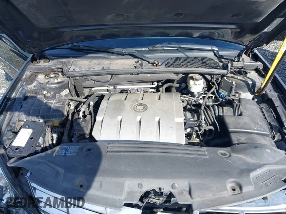2006 Cadillac DTS 1SC z VIN 1G6KD57YX6U100634, wystawiony jako IAAI lot #41671007 z przebiegiem Nie podano mil oraz . Historia ofert i sprzedaży dostępna na DreamBid. Obrazek 10.