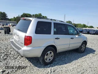 2005 Honda Pilot EX-L with VIN 2HKYF18505H500452, listed as a Copart auction lot 57552535 with 282,733 mi miles and Salvage title. Bid and sale history available at DreamBid. Image 3.