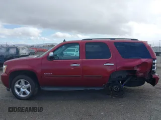 2010 Chevrolet Tahoe LS with VIN 1GNUCAE00AR156681, listed as a IAAI auction lot 41782438 with 303,979 mi miles and . Bid and sale history available at DreamBid. Image 14.