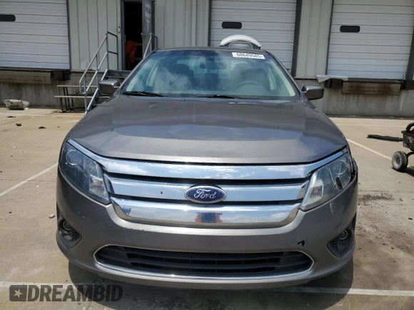 2010 Ford Fusion SE with VIN 3FAHP0HA4AR387638, listed as a Copart auction lot 60649585 with 210,779 mi miles and Salvage title. Bid and sale history available at DreamBid. Image 5.