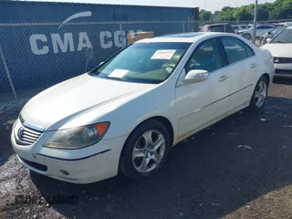 2005 Acura RL with VIN JH4KB16525C011436, listed as a IAAI auction lot 42563223 with 205,639 mi miles and . Bid and sale history available at DreamBid. Image 2.