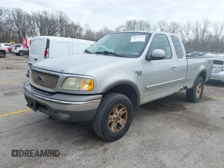 2003 Ford F-150 XL with VIN 1FTRX18L13NA95540, listed as a IAAI auction lot 41879632 with 1 mi miles. Bid and sale history available at carsss.com. Image 2.