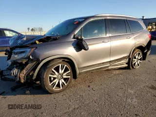 2020 Honda Pilot Touring 8-Passenger with VIN 5FNYF5H98LB007964, listed as a Copart auction lot 88583315 with 83,786 mi miles and Salvage Title. Bid and sale history available at DreamBid. Image 1.