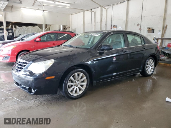 2010 Chrysler Sebring Limited with VIN 1C3CC5FB2AN229671, listed as a Copart auction lot 62181015 with 229,390 mi miles and Salvage title. Bid and sale history available at DreamBid. Image 1.