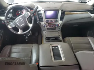 2016 GMC Yukon Denali with VIN 1GKS2CKJ0GR366206, listed as a Copart auction lot 52105185 with 150,141 mi miles and Salvage Title. Bid and sale history available at carsss.com. Image 8.