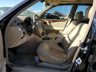1997 Mercedes-Benz E-Class with VIN WDBJF72F0VA523161, listed as a Copart auction lot 77752804 with 143,495 mi miles and Salvage Title. Bid and sale history available at carsss.com. Image 7.