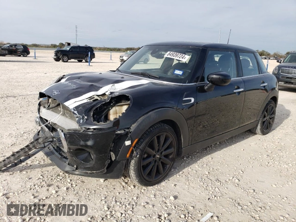 2021 MINI Hardtop 4 Door Oxford Edition with VIN WMWXU7C09M2N79553, listed as a Copart auction lot 84939724 with 59,139 mi miles and Salvage title. Bid and sale history available at DreamBid. Image 1.