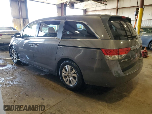 2014 Honda Odyssey EX-L with VIN 5FNRL5H6XEB134849, listed as a Copart auction lot 63617435 with 127,491 mi miles and Salvage title. Bid and sale history available at DreamBid. Image 2.