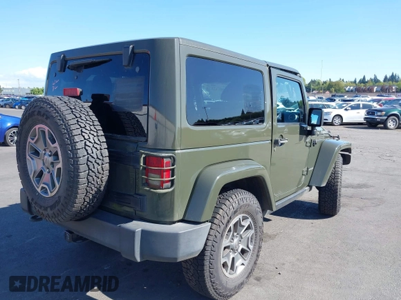 2015 Jeep Wrangler Rubicon Hard Rock with VIN 1C4BJWCGXFL771669, listed as a IAAI auction lot 42057423 with 36,996 mi miles and . Bid and sale history available at DreamBid. Image 4.
