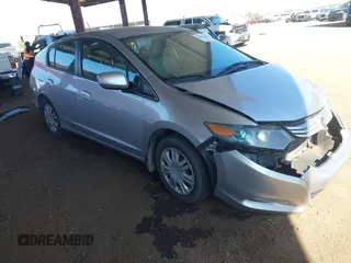 2010 Honda Insight LX z VIN JHMZE2H53AS007016, wystawiony jako IAAI lot #42096274 z przebiegiem 173 519 mil mil oraz . Historia ofert i sprzedaży dostępna na DreamBid. Obrazek 1.