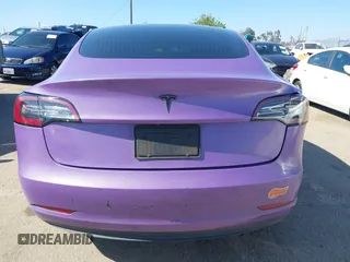 2020 Tesla Model 3 Standard Range Plus with VIN 5YJ3E1EA0LF739462, listed as a IAAI auction lot 42081889 with 65,254 mi miles. Bid and sale history available at carsss.com. Image 16.