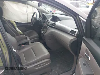 2016 Honda Odyssey Touring Elite with VIN 5FNRL5H97GB010048, listed as a IAAI auction lot 40212711 with 119,009 mi miles and . Bid and sale history available at DreamBid. Image 5.