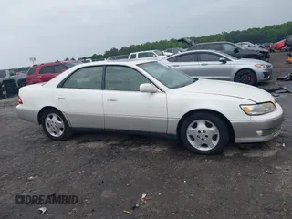 2001 Lexus ES 300 z VIN JT8BF28G410307451, wystawiony jako IAAI lot #42369871 z przebiegiem 290 620 mil mil oraz . Historia ofert i sprzedaży dostępna na DreamBid. Obrazek 13.